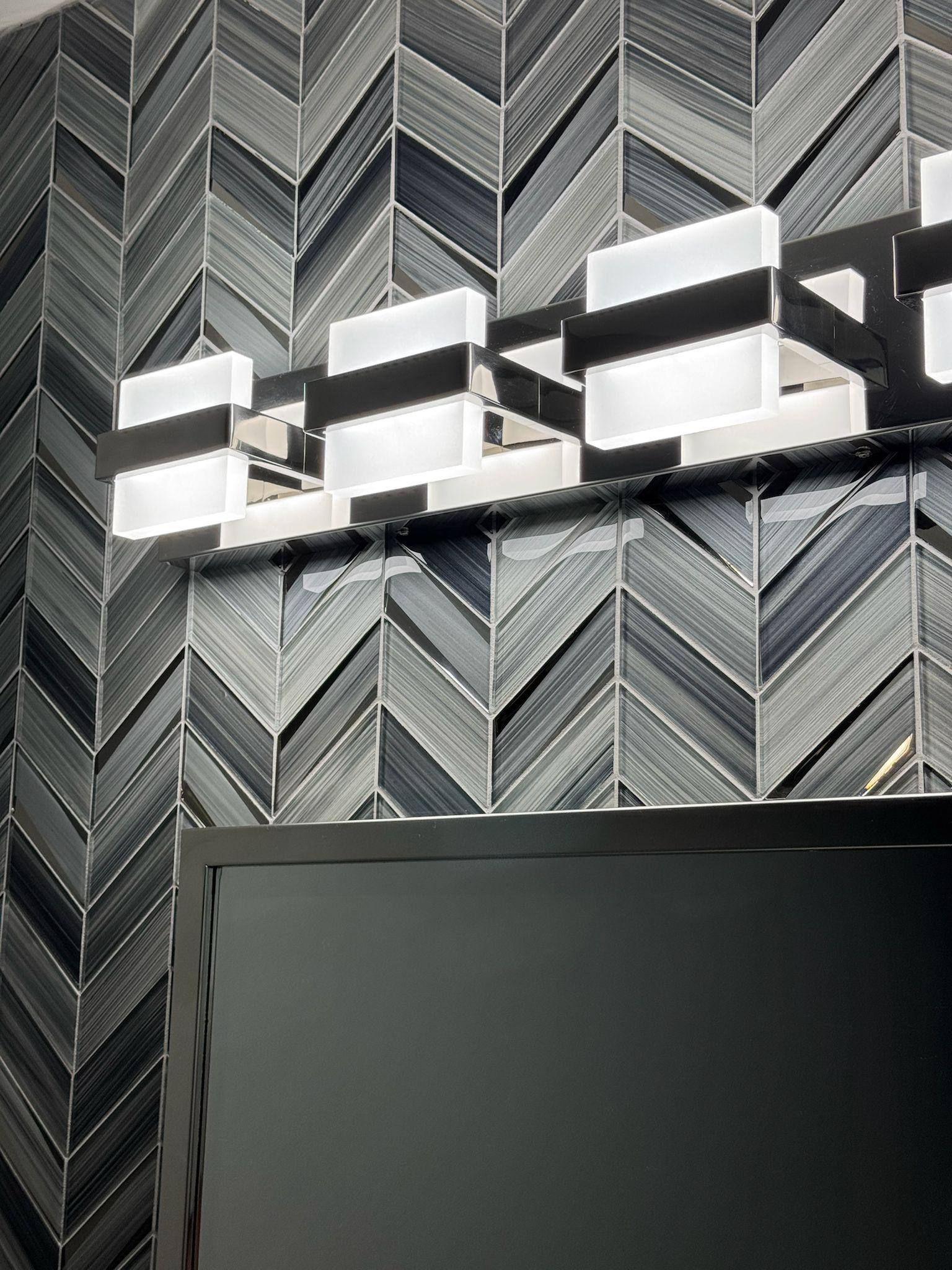Charcoal chevron glass backsplash close-up