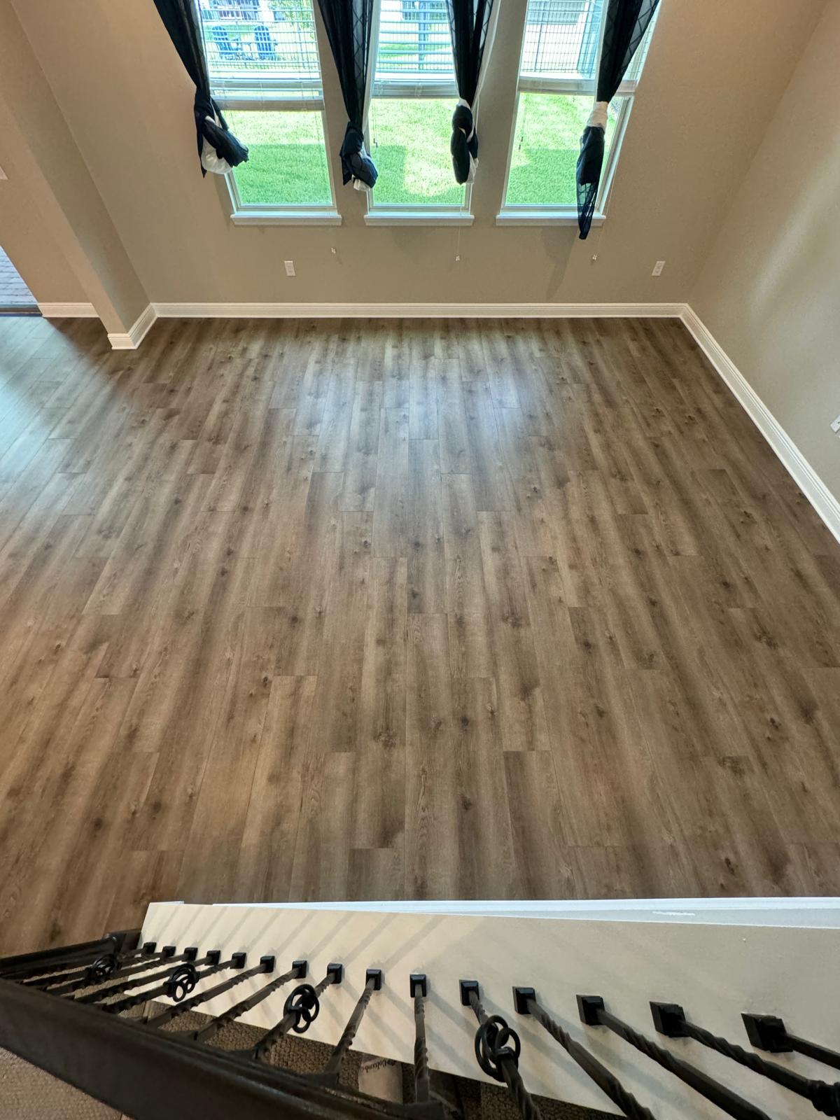 Wide-plank wood flooring detail